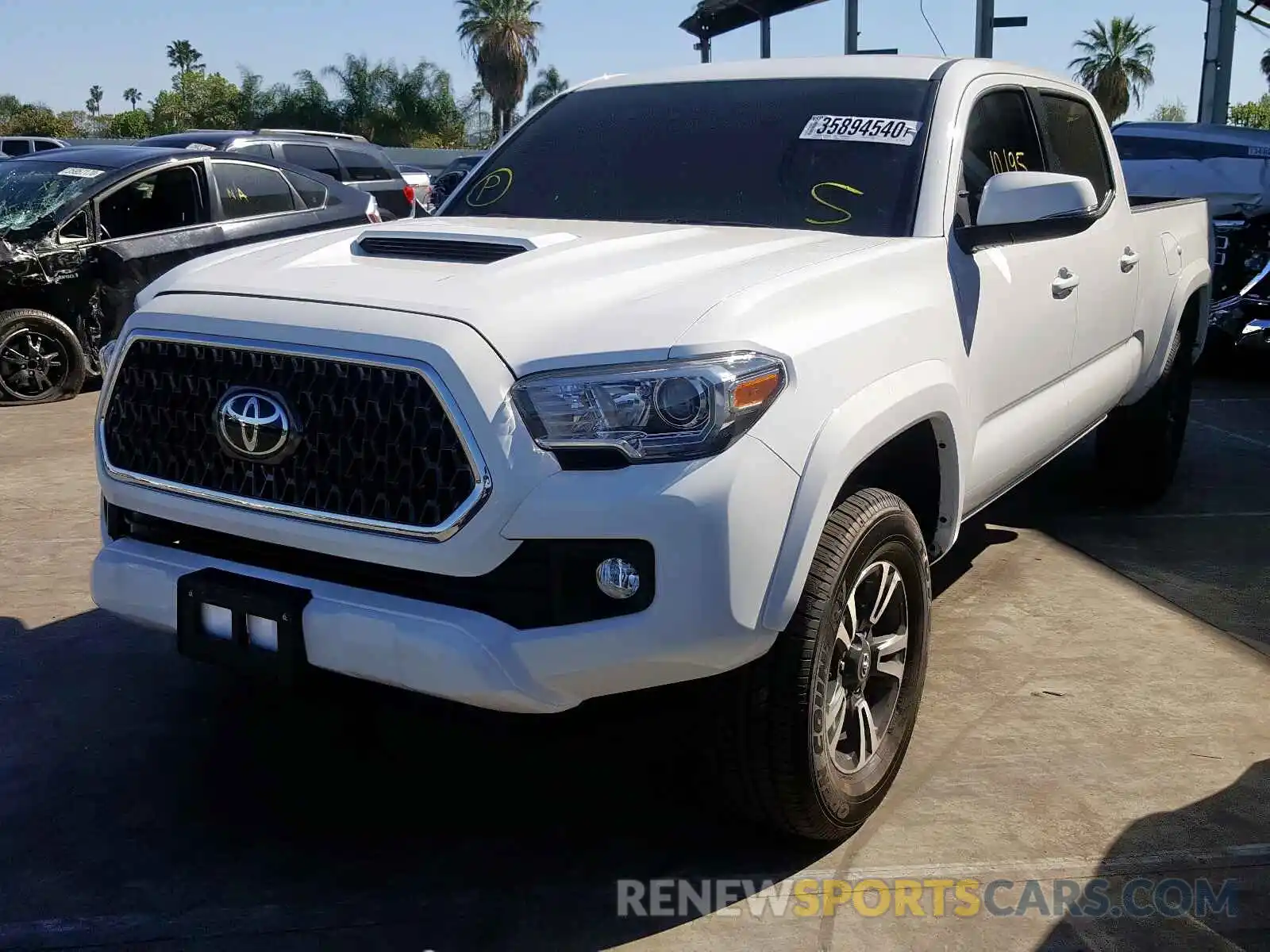 2 Photograph of a damaged car 3TMDZ5BN8KM063389 TOYOTA TACOMA 2019