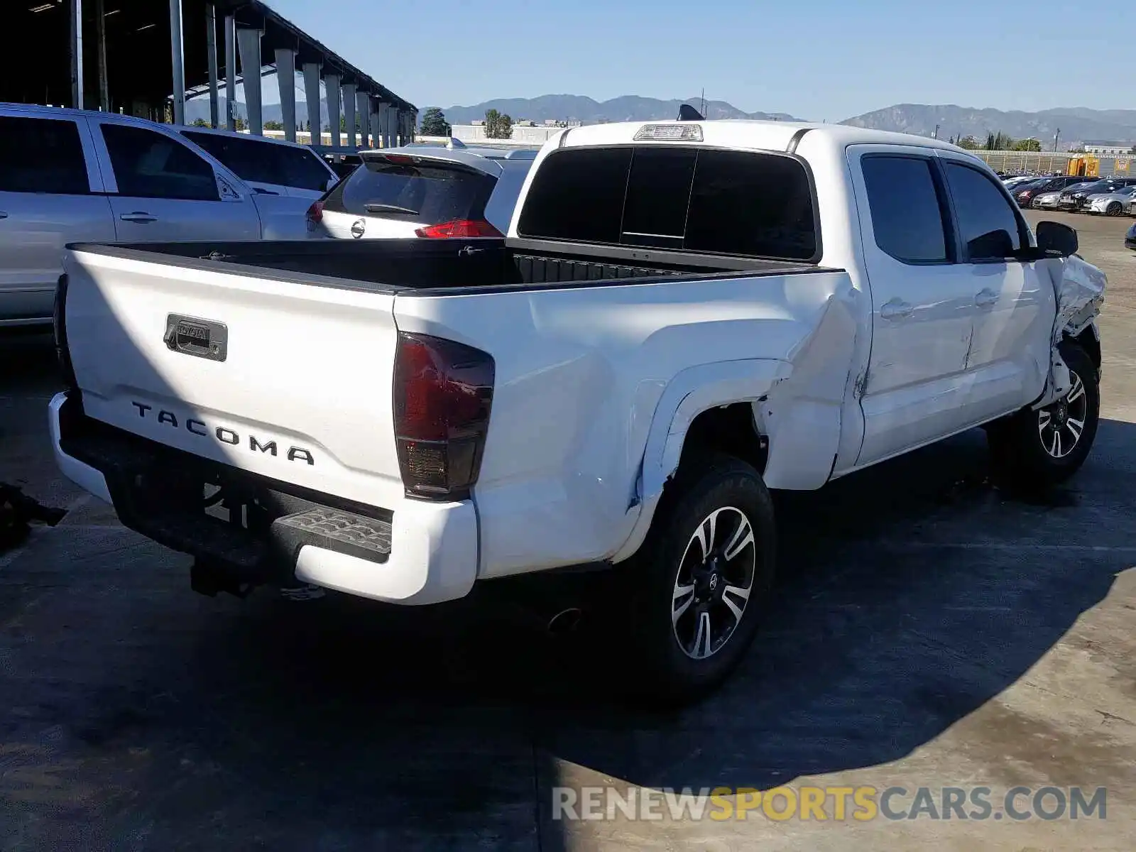 4 Photograph of a damaged car 3TMDZ5BN8KM063389 TOYOTA TACOMA 2019