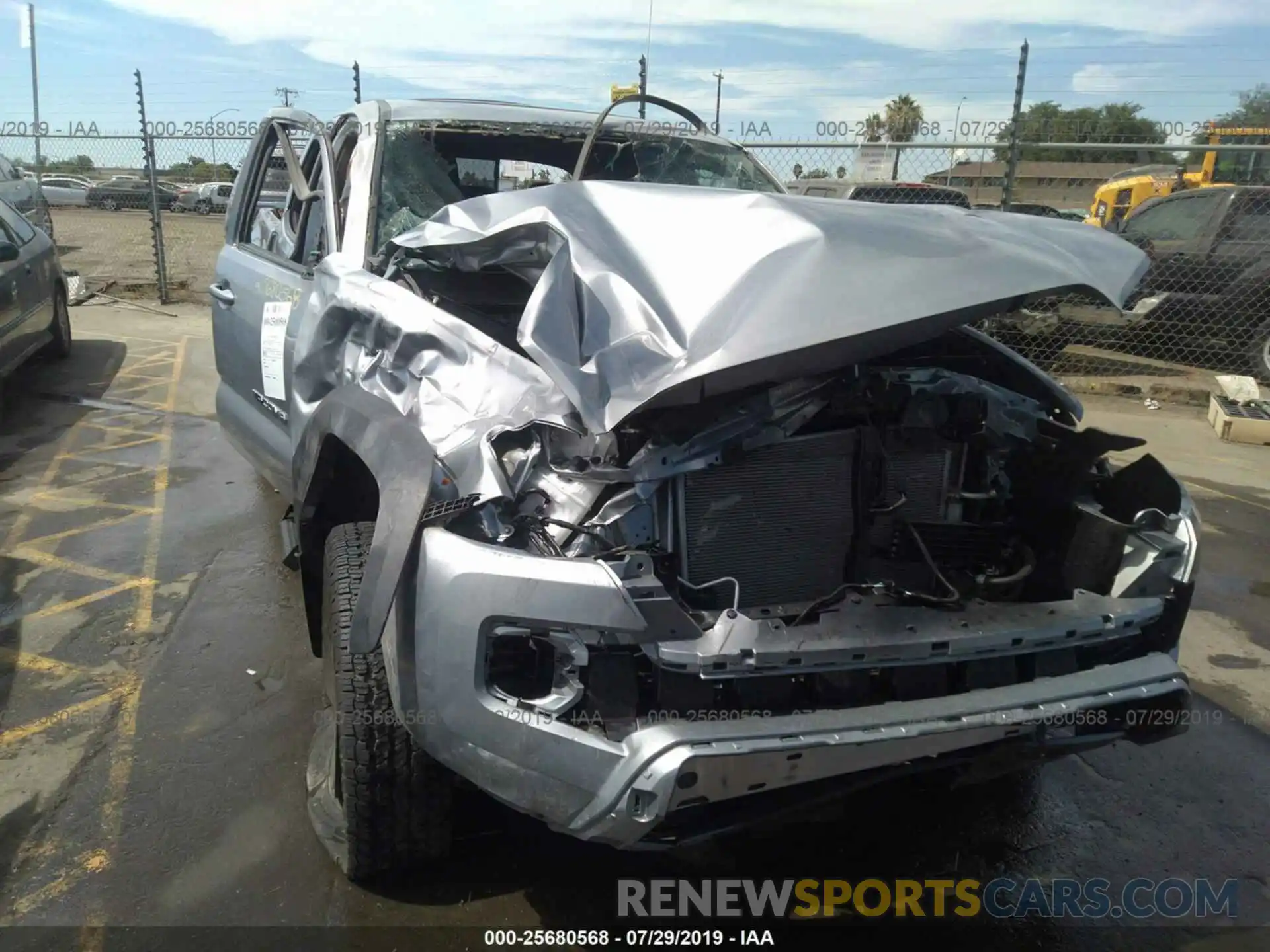 6 Photograph of a damaged car 3TMDZ5BN8KM064753 TOYOTA TACOMA 2019