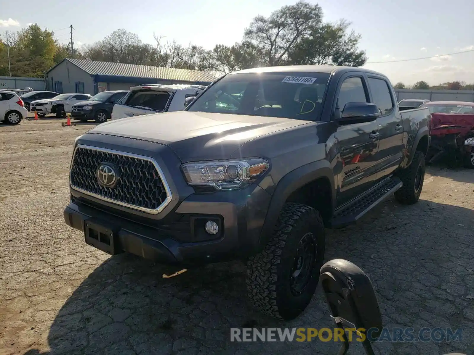 2 Photograph of a damaged car 3TMDZ5BN8KM070231 TOYOTA TACOMA 2019