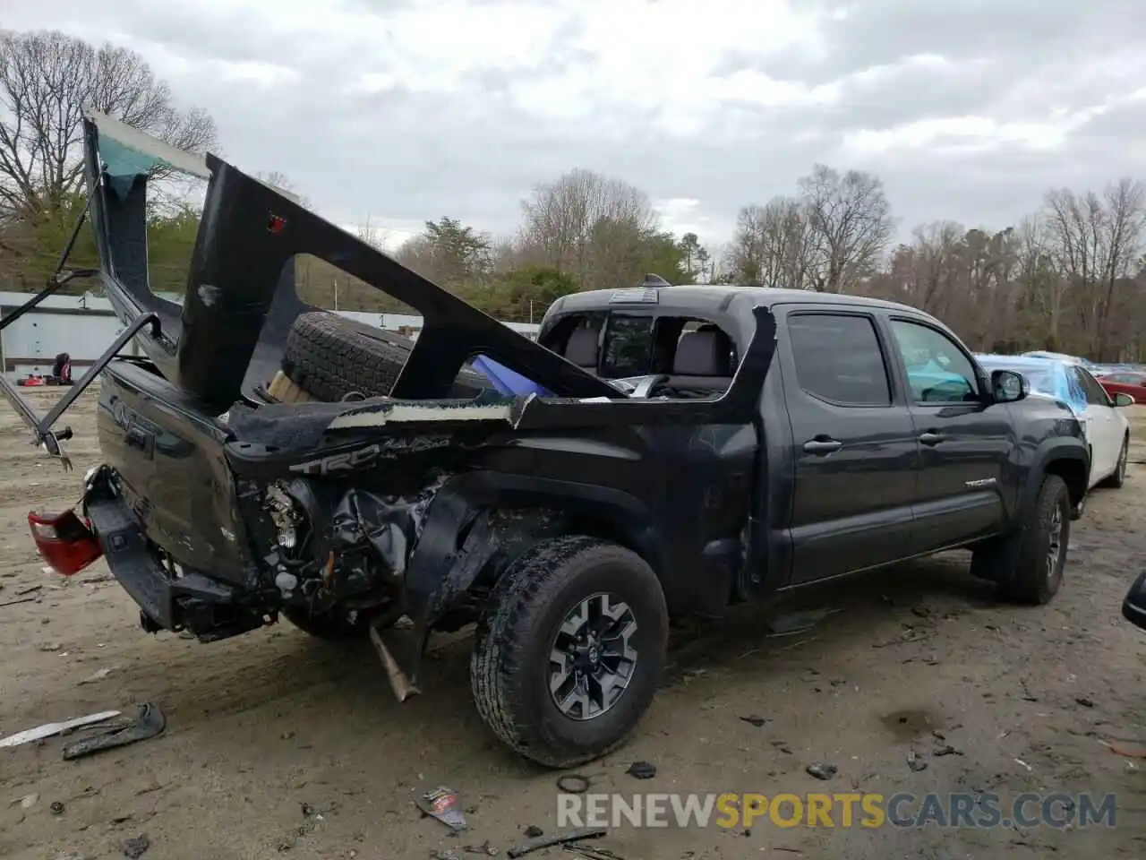 4 Photograph of a damaged car 3TMDZ5BN8KM074991 TOYOTA TACOMA 2019