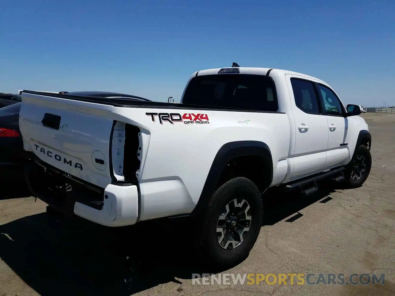 4 Photograph of a damaged car 3TMDZ5BN9KM058850 TOYOTA TACOMA 2019