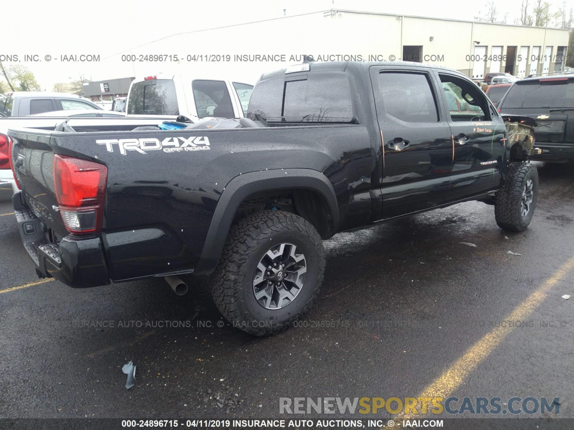 4 Photograph of a damaged car 3TMDZ5BN9KM060971 TOYOTA TACOMA 2019