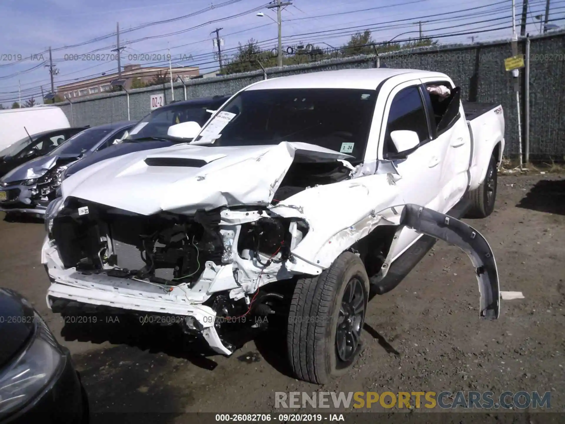 2 Photograph of a damaged car 3TMDZ5BN9KM062283 TOYOTA TACOMA 2019