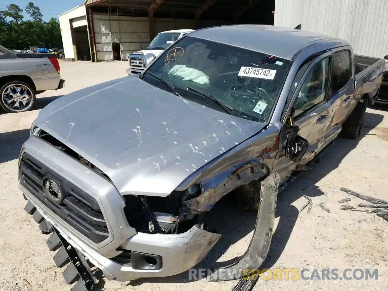 2 Photograph of a damaged car 3TMDZ5BN9KM064485 TOYOTA TACOMA 2019