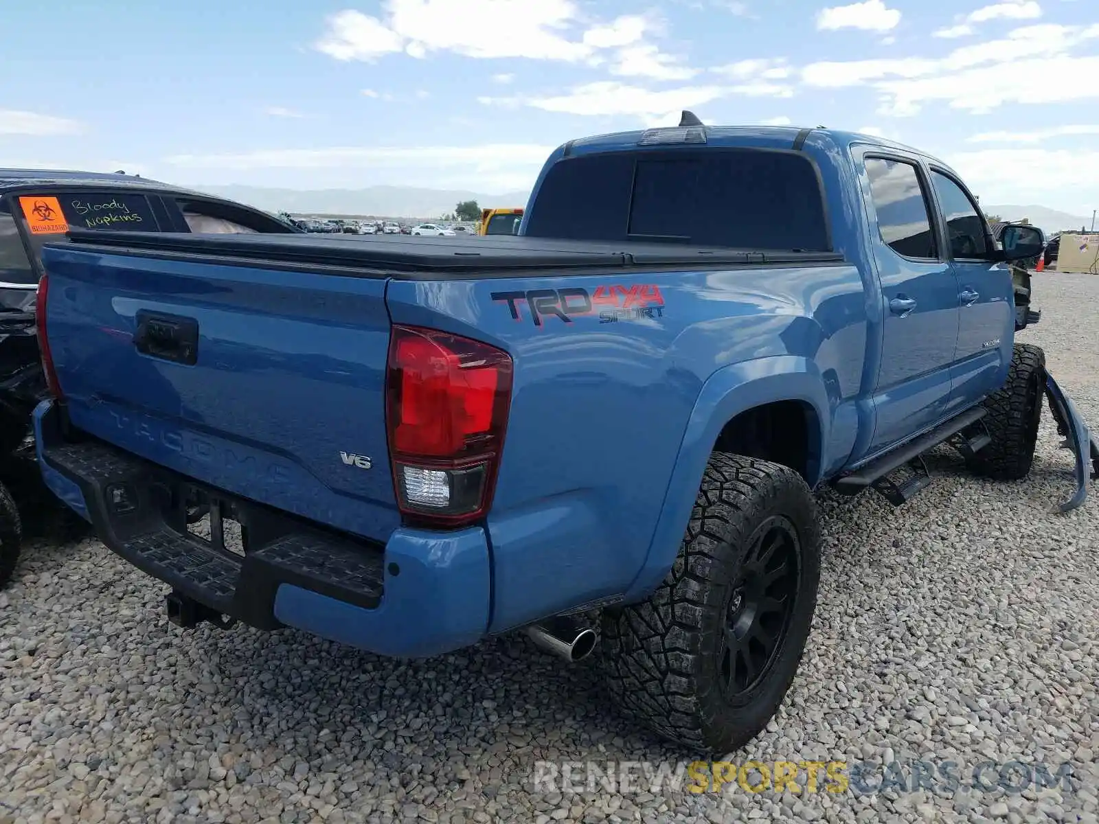 4 Photograph of a damaged car 3TMDZ5BN9KM065734 TOYOTA TACOMA 2019