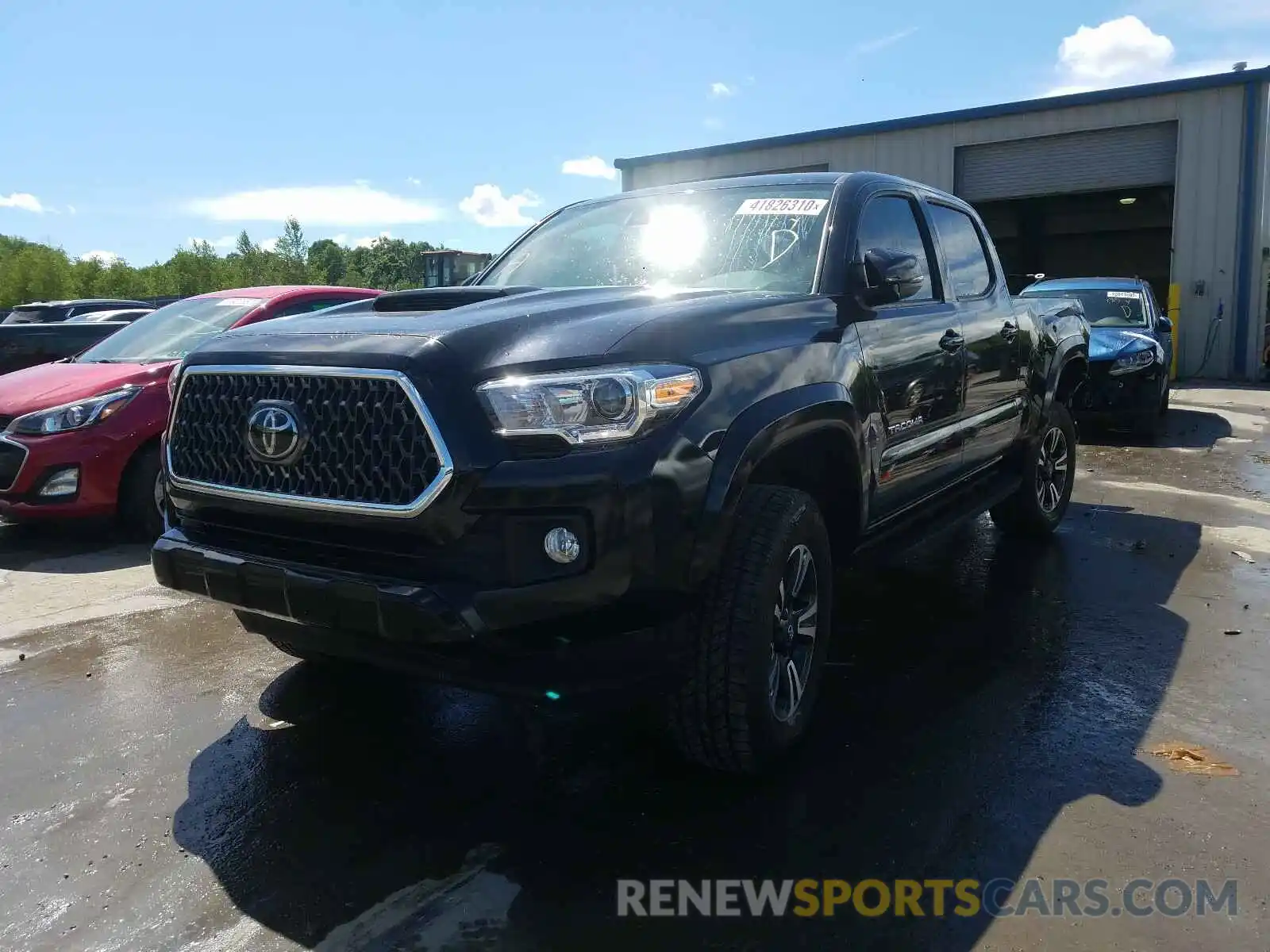 2 Photograph of a damaged car 3TMDZ5BN9KM070626 TOYOTA TACOMA 2019