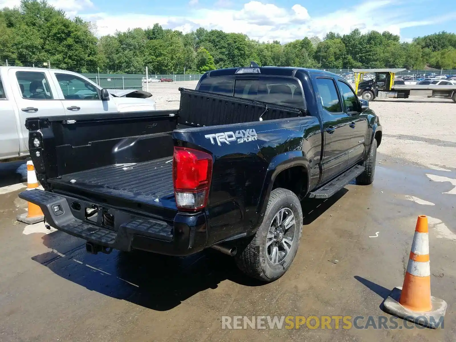 4 Photograph of a damaged car 3TMDZ5BN9KM070626 TOYOTA TACOMA 2019