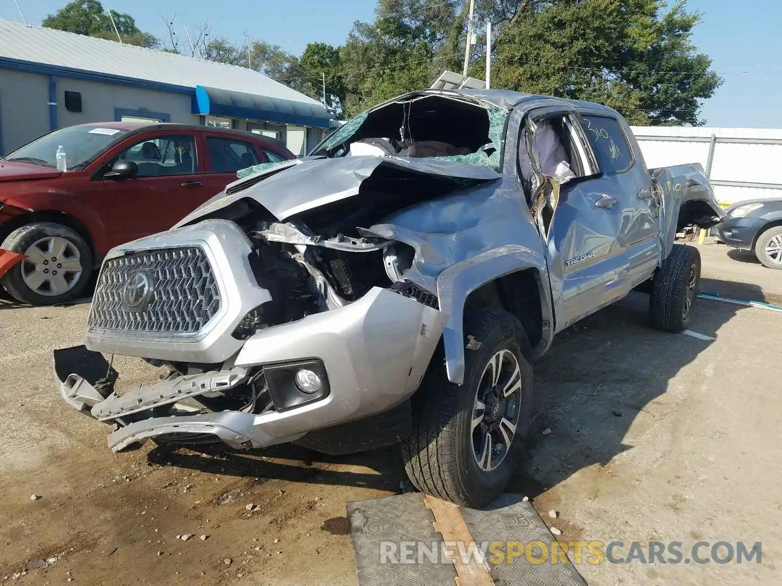 2 Photograph of a damaged car 3TMDZ5BN9KM073221 TOYOTA TACOMA 2019