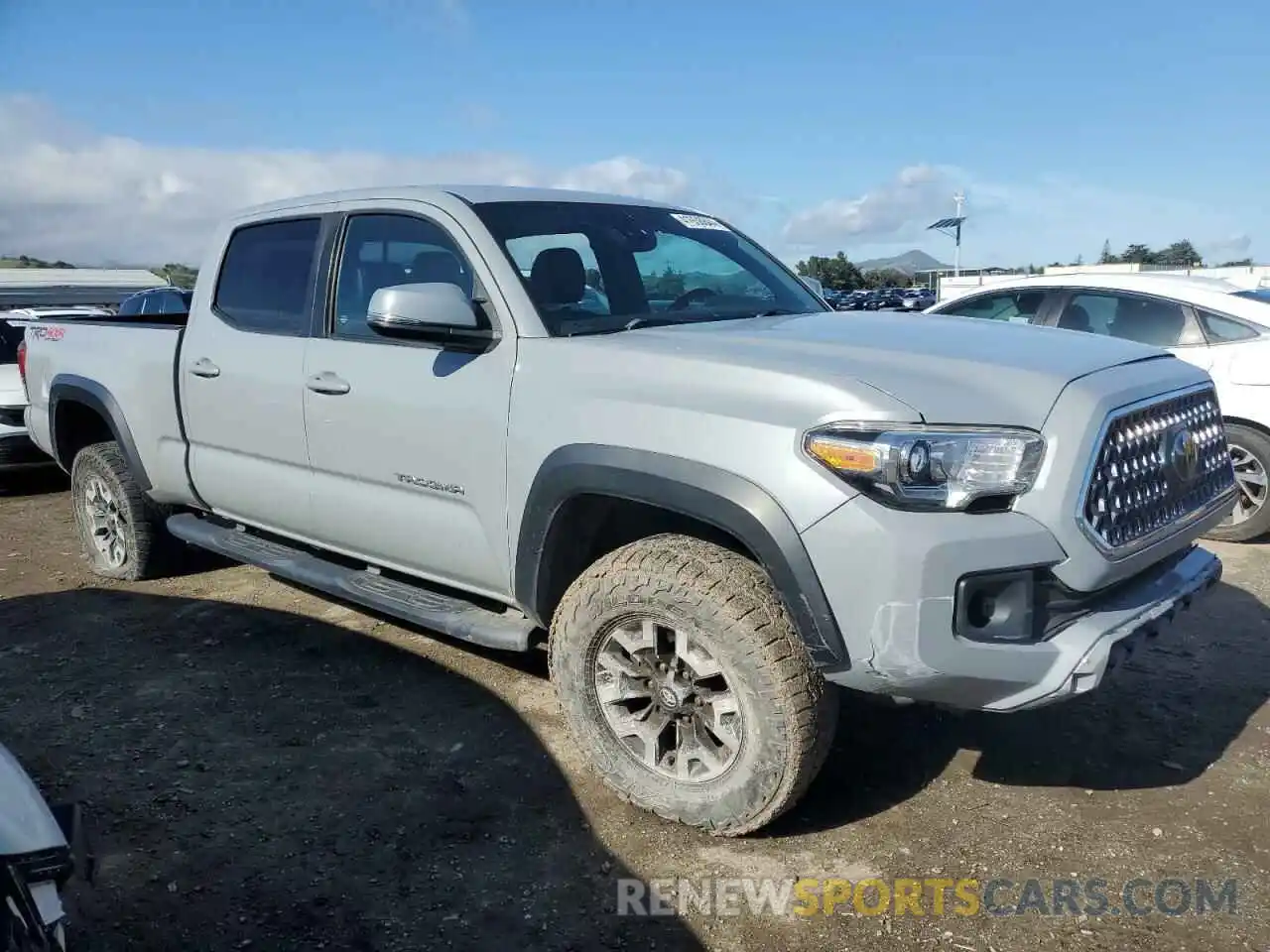 4 Photograph of a damaged car 3TMDZ5BN9KM075163 TOYOTA TACOMA 2019