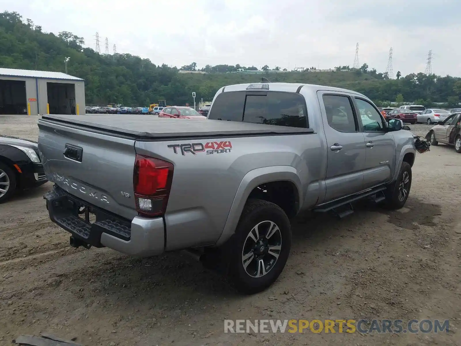 4 Photograph of a damaged car 3TMDZ5BN9KM079715 TOYOTA TACOMA 2019