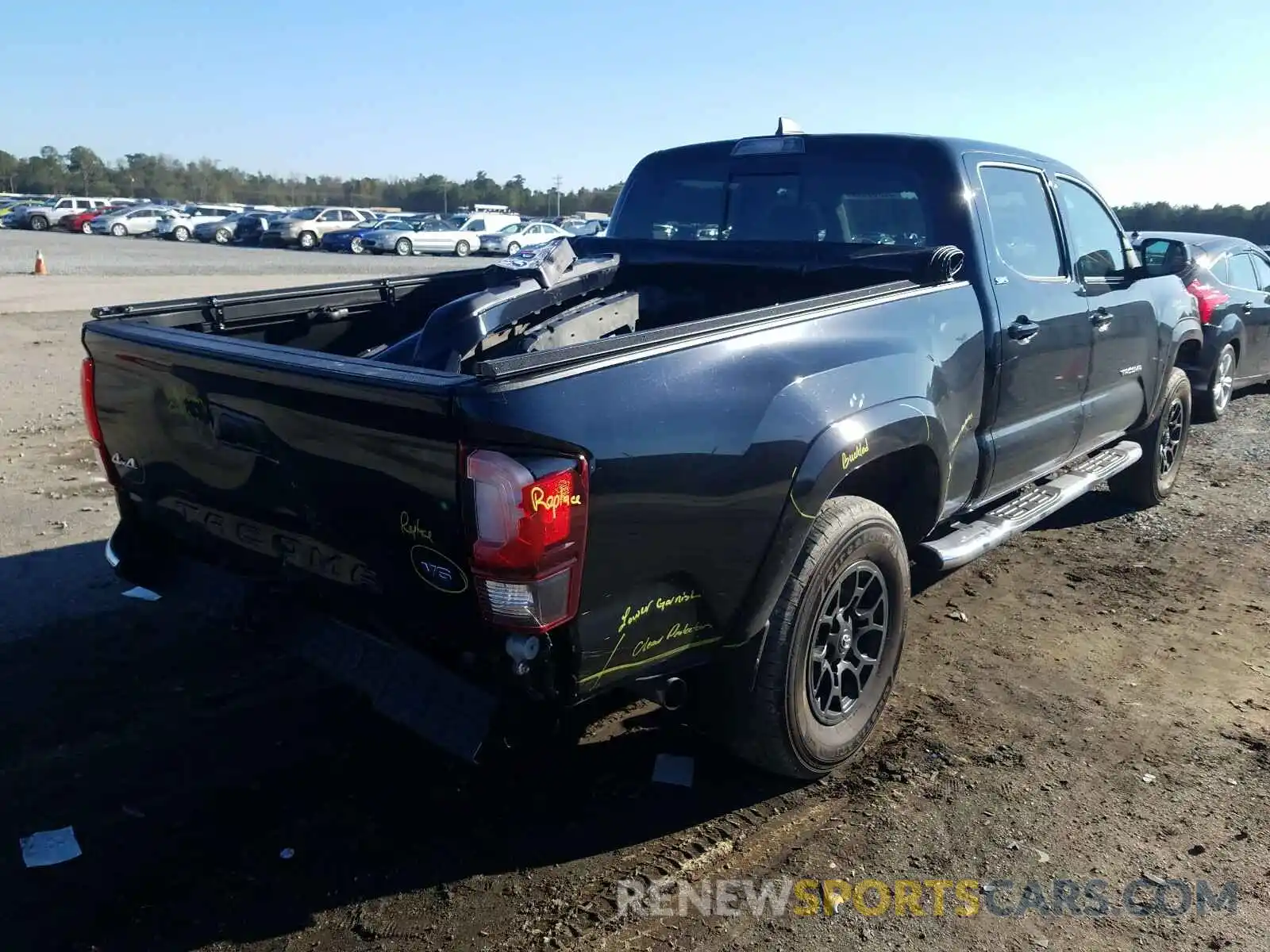 4 Photograph of a damaged car 3TMDZ5BNXKM055973 TOYOTA TACOMA 2019