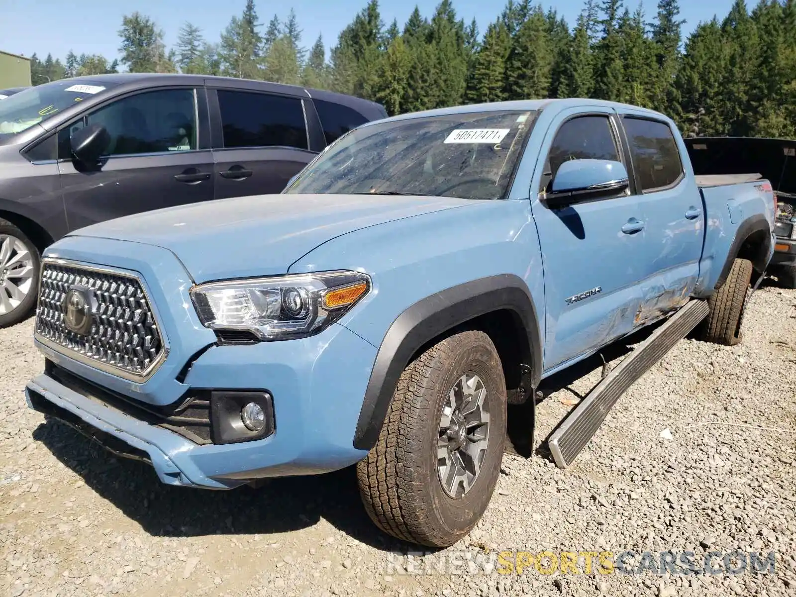 2 Photograph of a damaged car 3TMDZ5BNXKM061790 TOYOTA TACOMA 2019