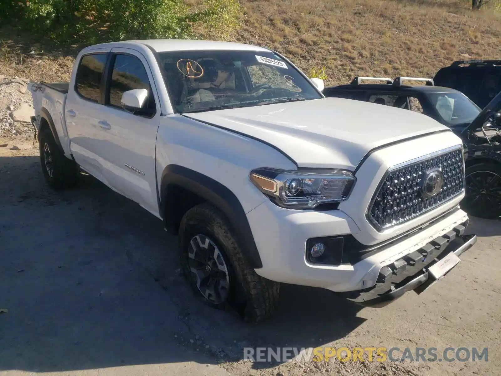 1 Photograph of a damaged car 3TMDZ5BNXKM064284 TOYOTA TACOMA 2019