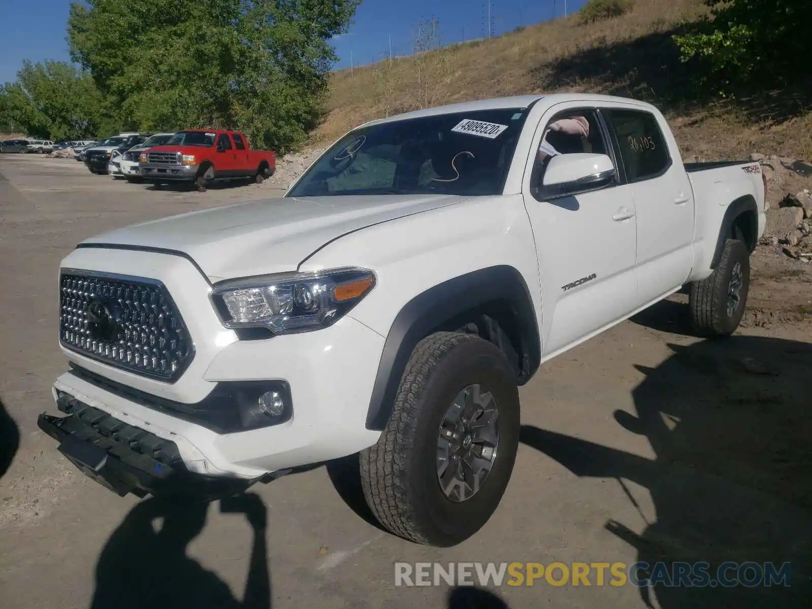 2 Photograph of a damaged car 3TMDZ5BNXKM064284 TOYOTA TACOMA 2019