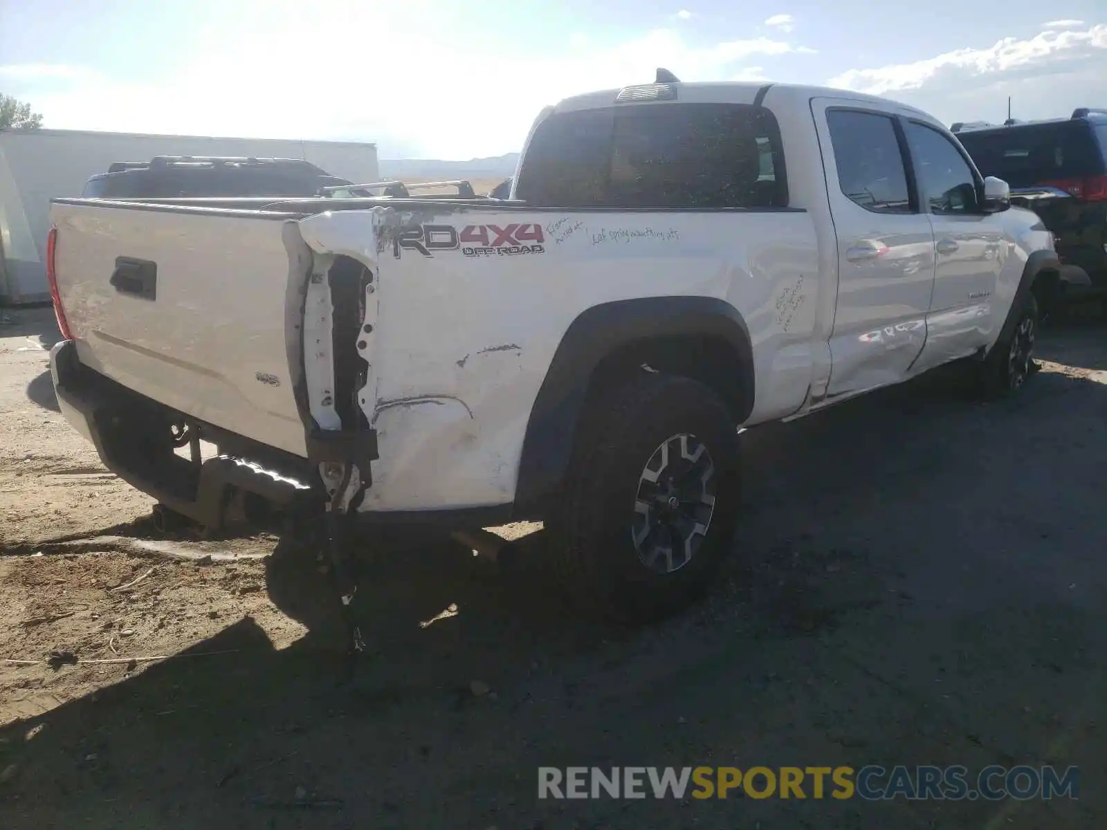 4 Photograph of a damaged car 3TMDZ5BNXKM064284 TOYOTA TACOMA 2019