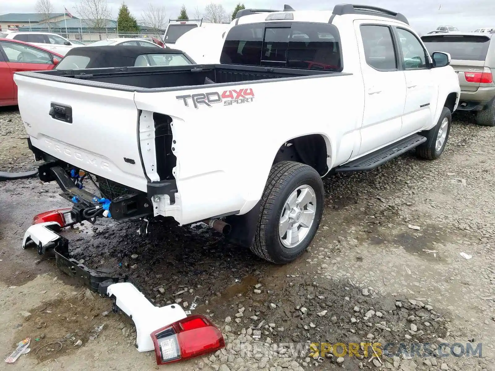 4 Photograph of a damaged car 3TMDZ5BNXKM064964 TOYOTA TACOMA 2019