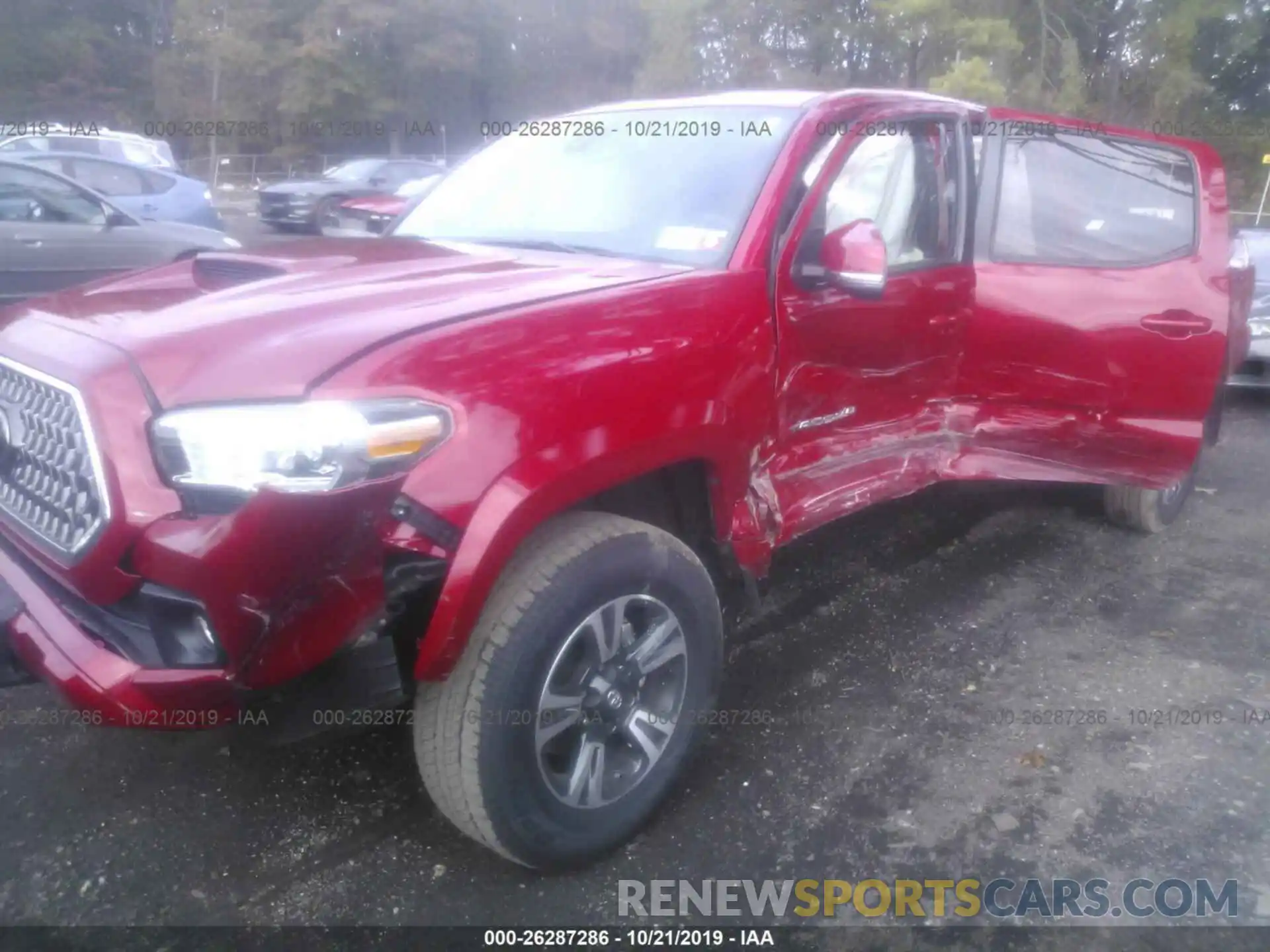 6 Photograph of a damaged car 3TMDZ5BNXKM066777 TOYOTA TACOMA 2019