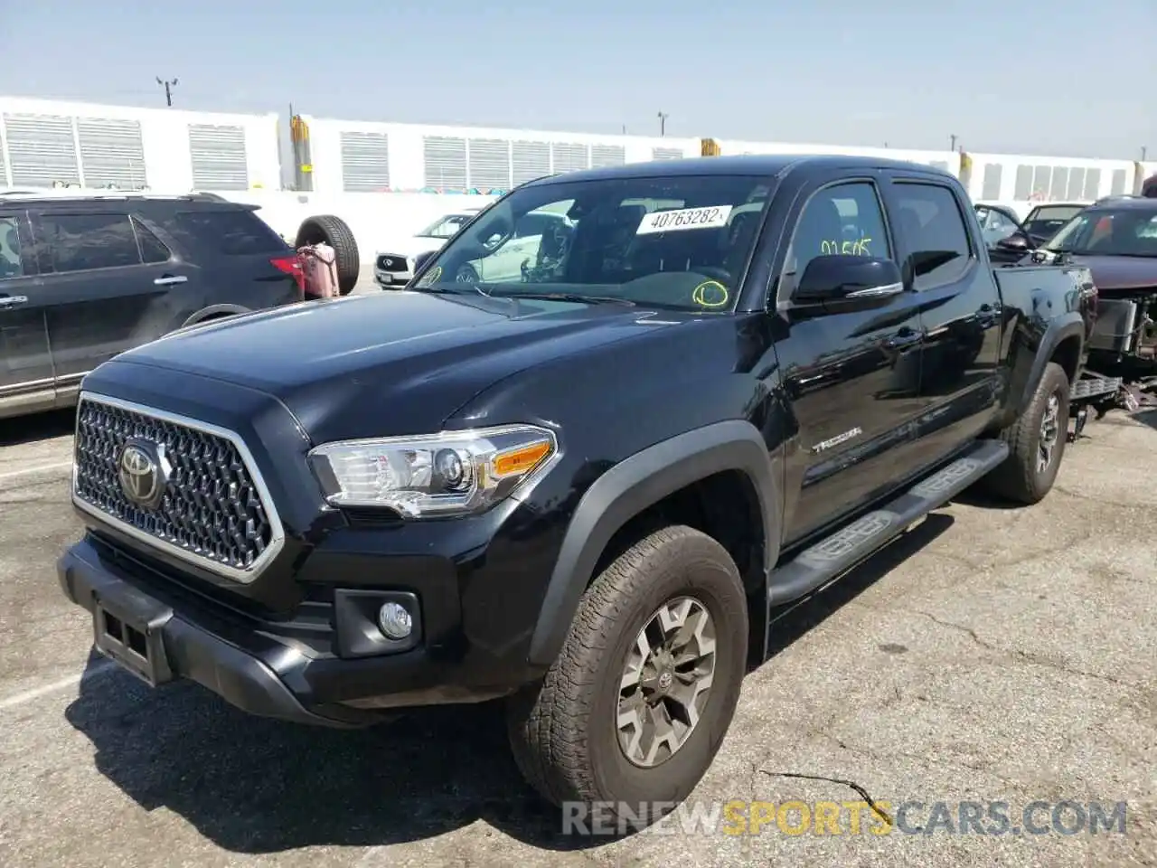 2 Photograph of a damaged car 3TMDZ5BNXKM067637 TOYOTA TACOMA 2019