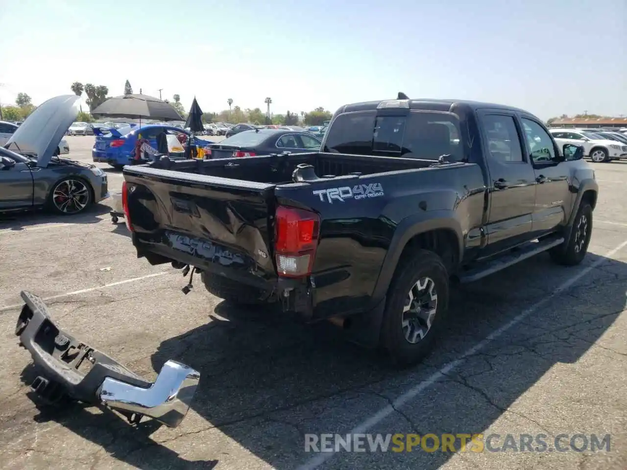 4 Photograph of a damaged car 3TMDZ5BNXKM067637 TOYOTA TACOMA 2019