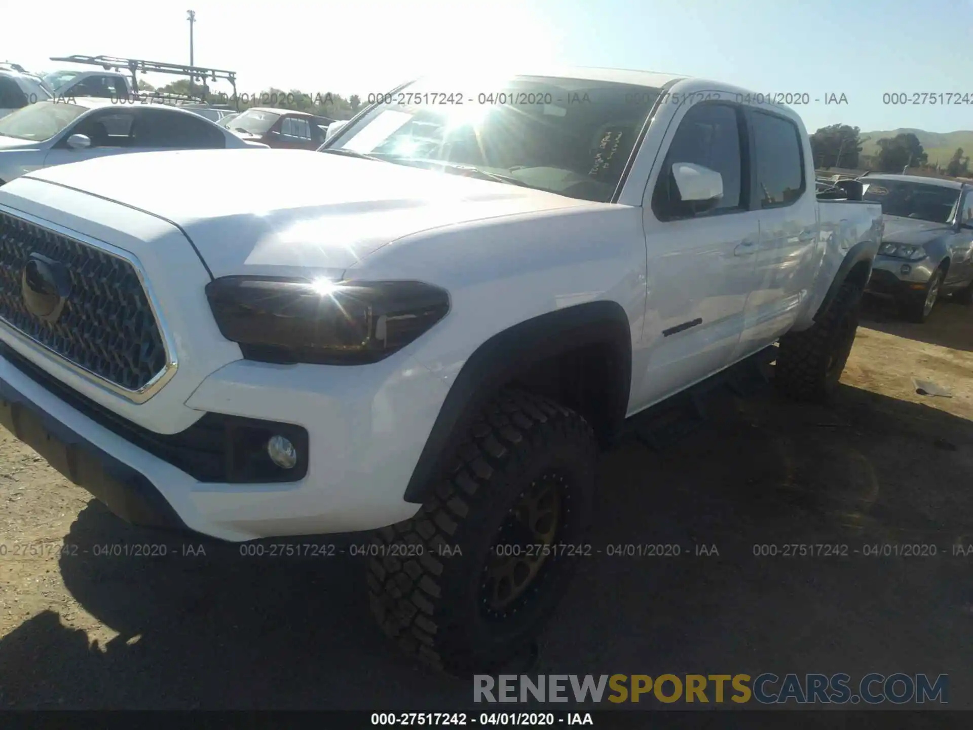 2 Photograph of a damaged car 3TMDZ5BNXKM070649 TOYOTA TACOMA 2019