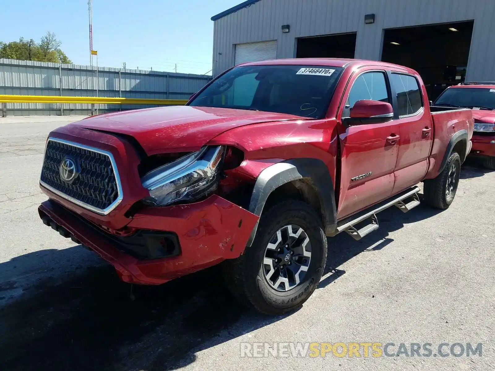 2 Photograph of a damaged car 3TMDZ5BNXKM072563 TOYOTA TACOMA 2019