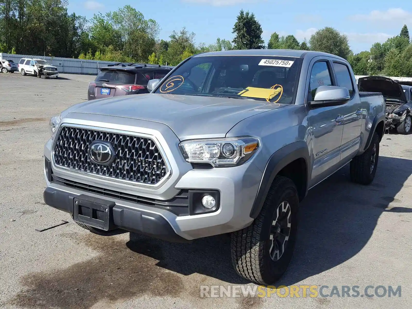 2 Photograph of a damaged car 3TMDZ5BNXKM077648 TOYOTA TACOMA 2019