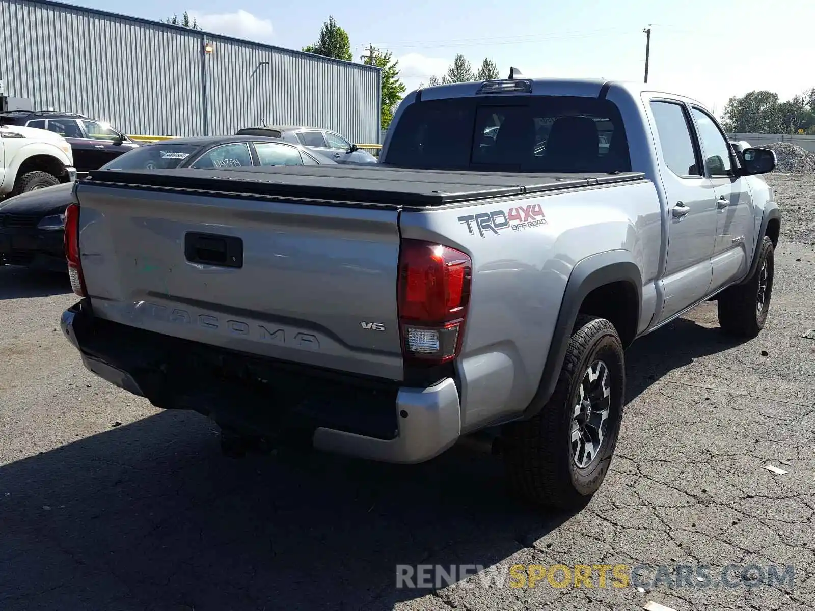 4 Photograph of a damaged car 3TMDZ5BNXKM077648 TOYOTA TACOMA 2019