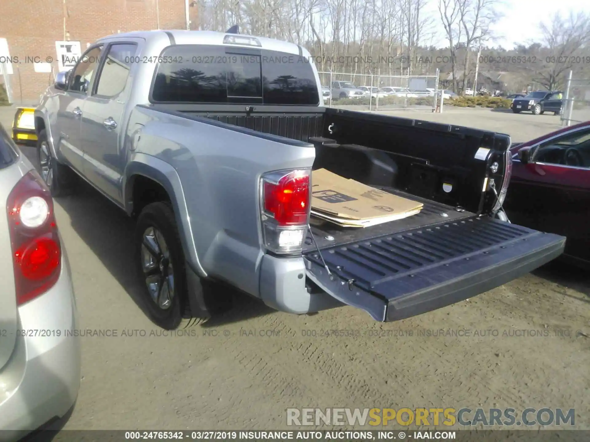 3 Photograph of a damaged car 3TMGZ5AN0KM193939 TOYOTA TACOMA 2019