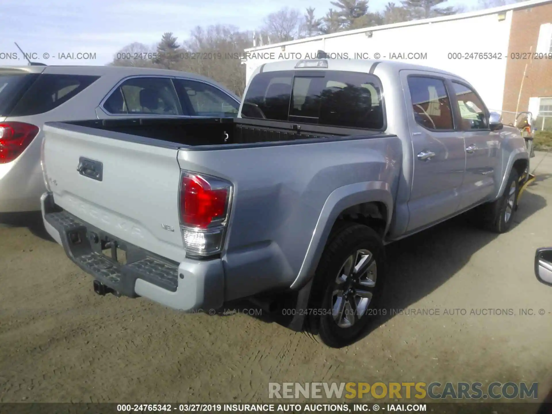 4 Photograph of a damaged car 3TMGZ5AN0KM193939 TOYOTA TACOMA 2019