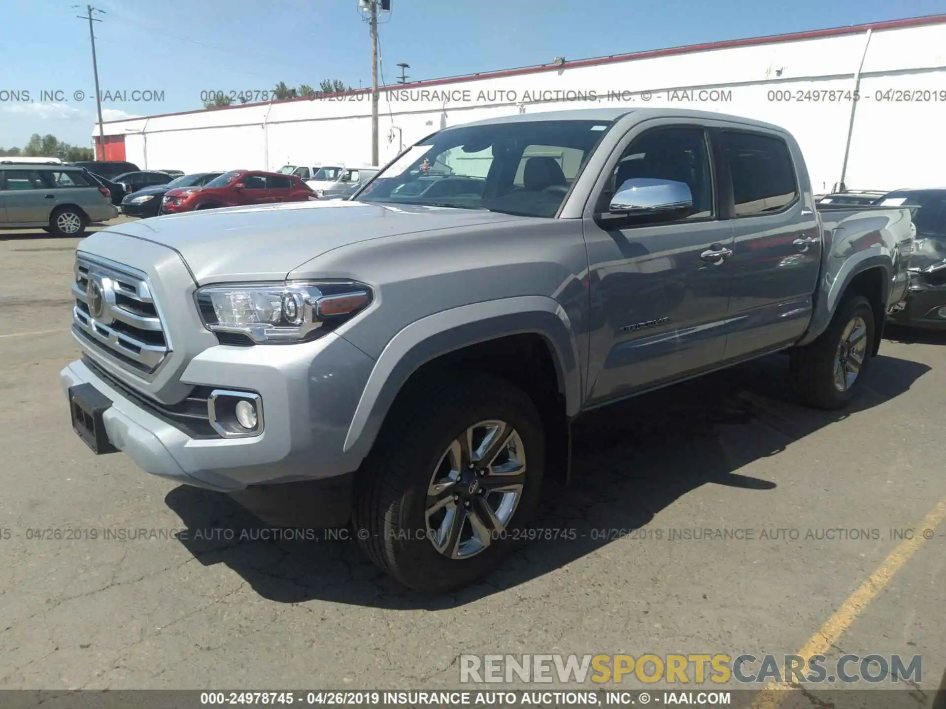 2 Photograph of a damaged car 3TMGZ5AN1KM201563 TOYOTA TACOMA 2019