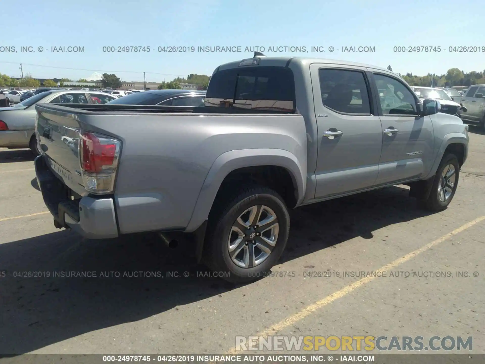 4 Photograph of a damaged car 3TMGZ5AN1KM201563 TOYOTA TACOMA 2019