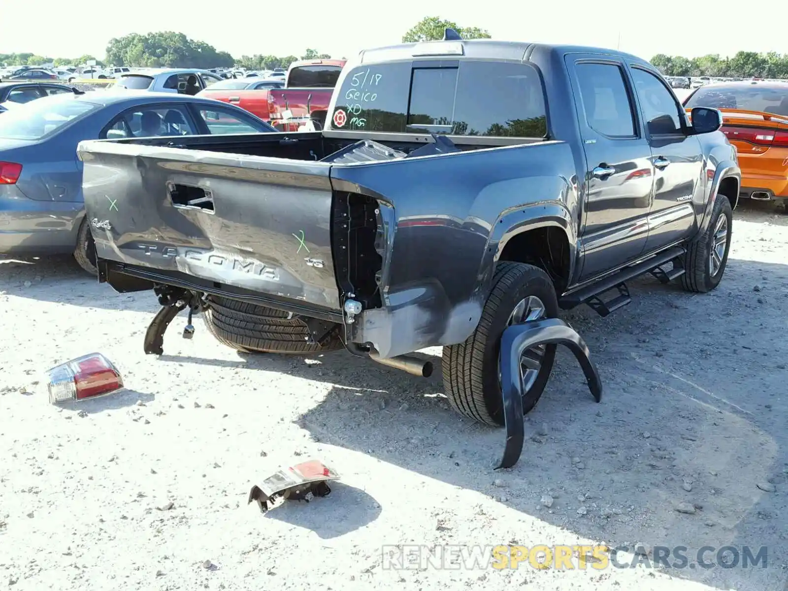 4 Photograph of a damaged car 3TMGZ5AN1KM264369 TOYOTA TACOMA 2019