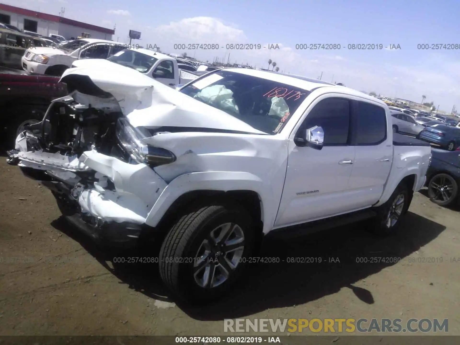 2 Photograph of a damaged car 3TMGZ5AN2KM193361 TOYOTA TACOMA 2019