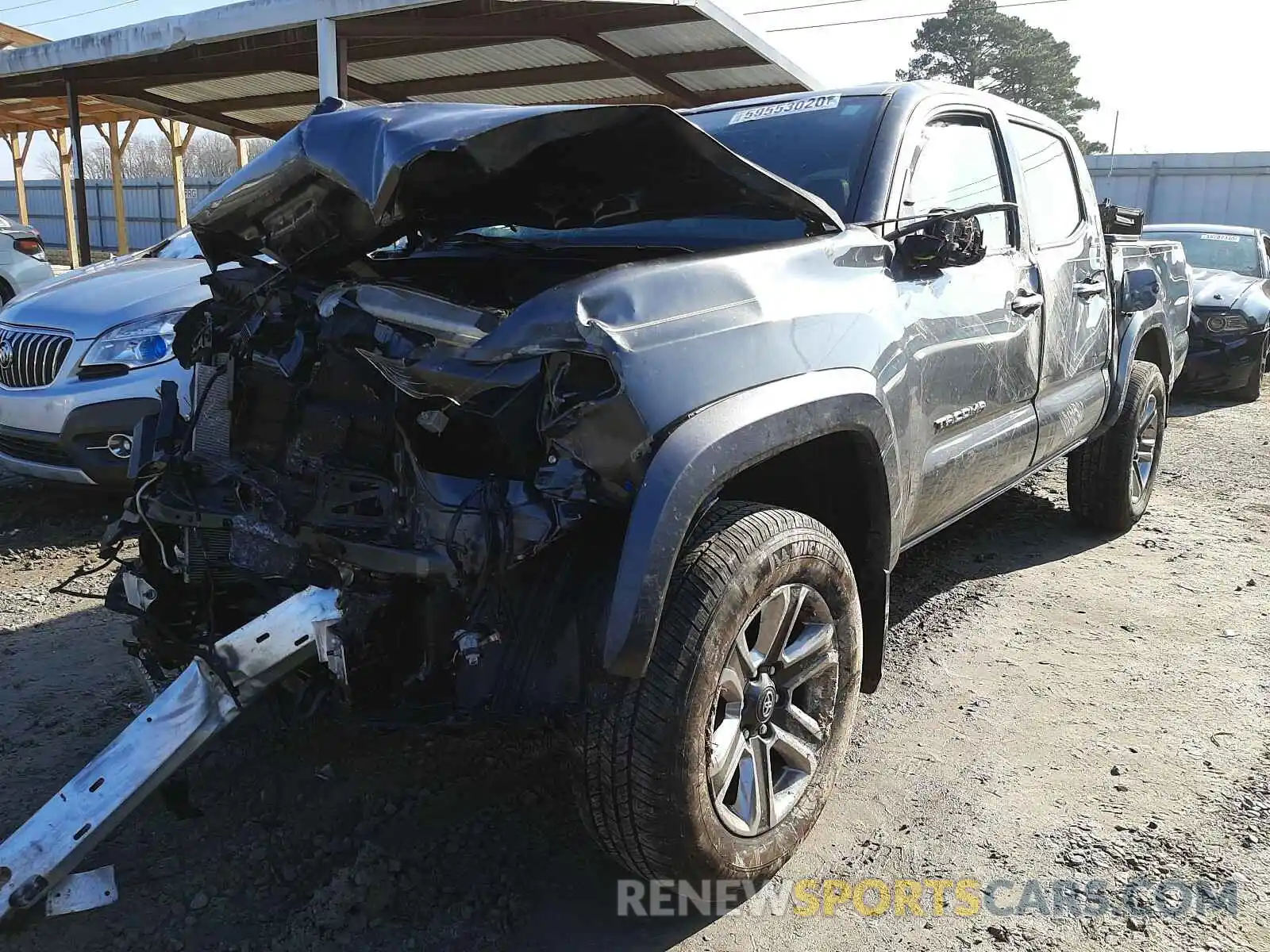 2 Photograph of a damaged car 3TMGZ5AN2KM213107 TOYOTA TACOMA 2019