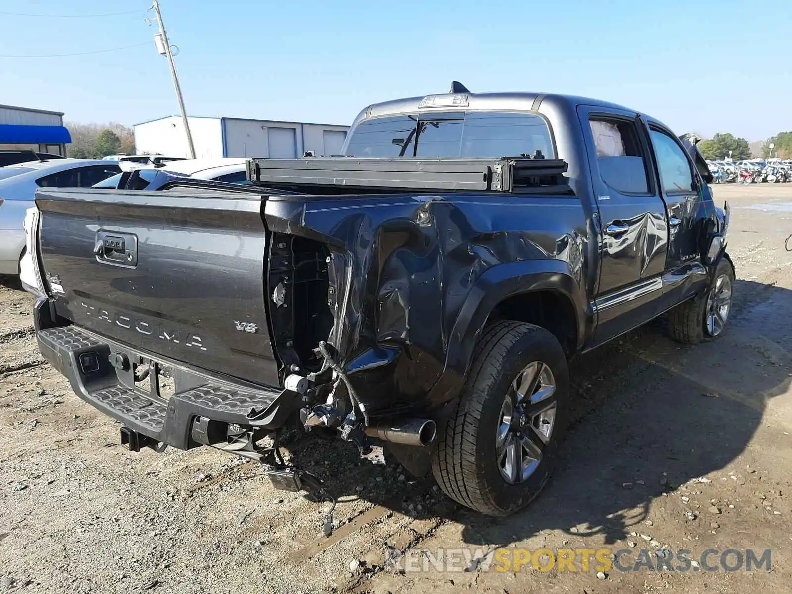 4 Photograph of a damaged car 3TMGZ5AN2KM213107 TOYOTA TACOMA 2019