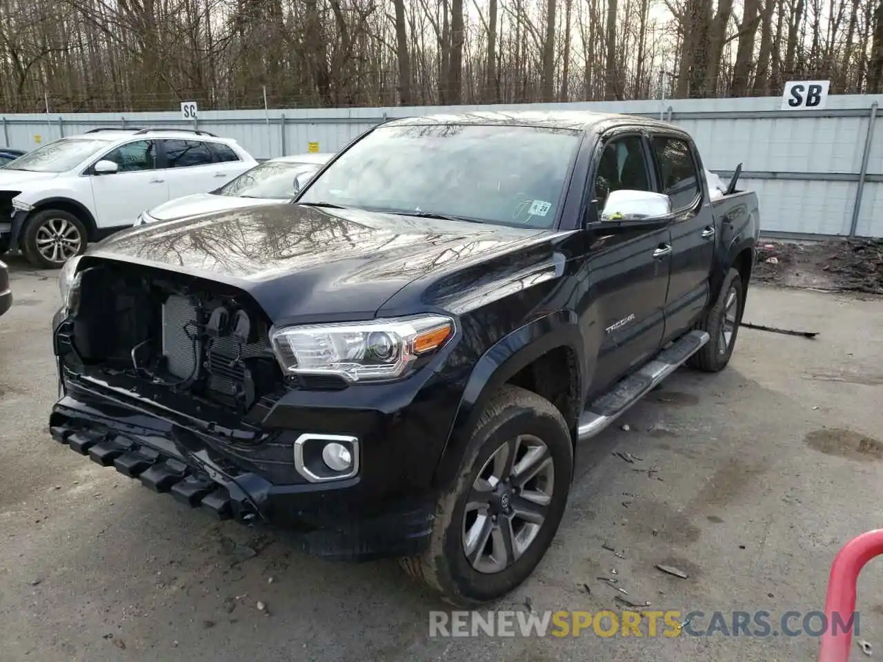 2 Photograph of a damaged car 3TMGZ5AN2KM230358 TOYOTA TACOMA 2019