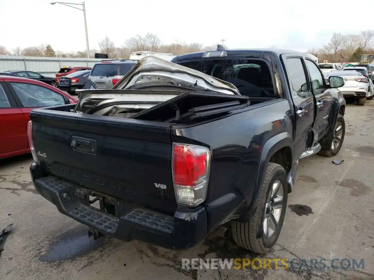 4 Photograph of a damaged car 3TMGZ5AN2KM230358 TOYOTA TACOMA 2019