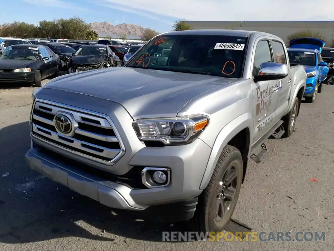 2 Photograph of a damaged car 3TMGZ5AN2KM230442 TOYOTA TACOMA 2019