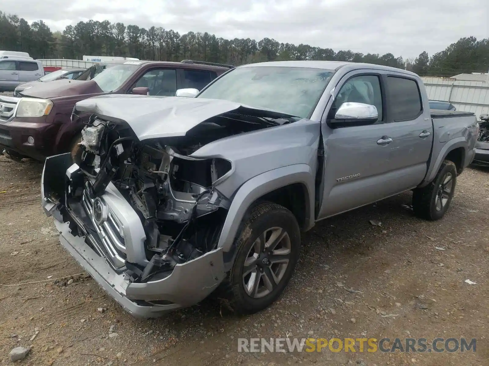 2 Photograph of a damaged car 3TMGZ5AN3KM208692 TOYOTA TACOMA 2019