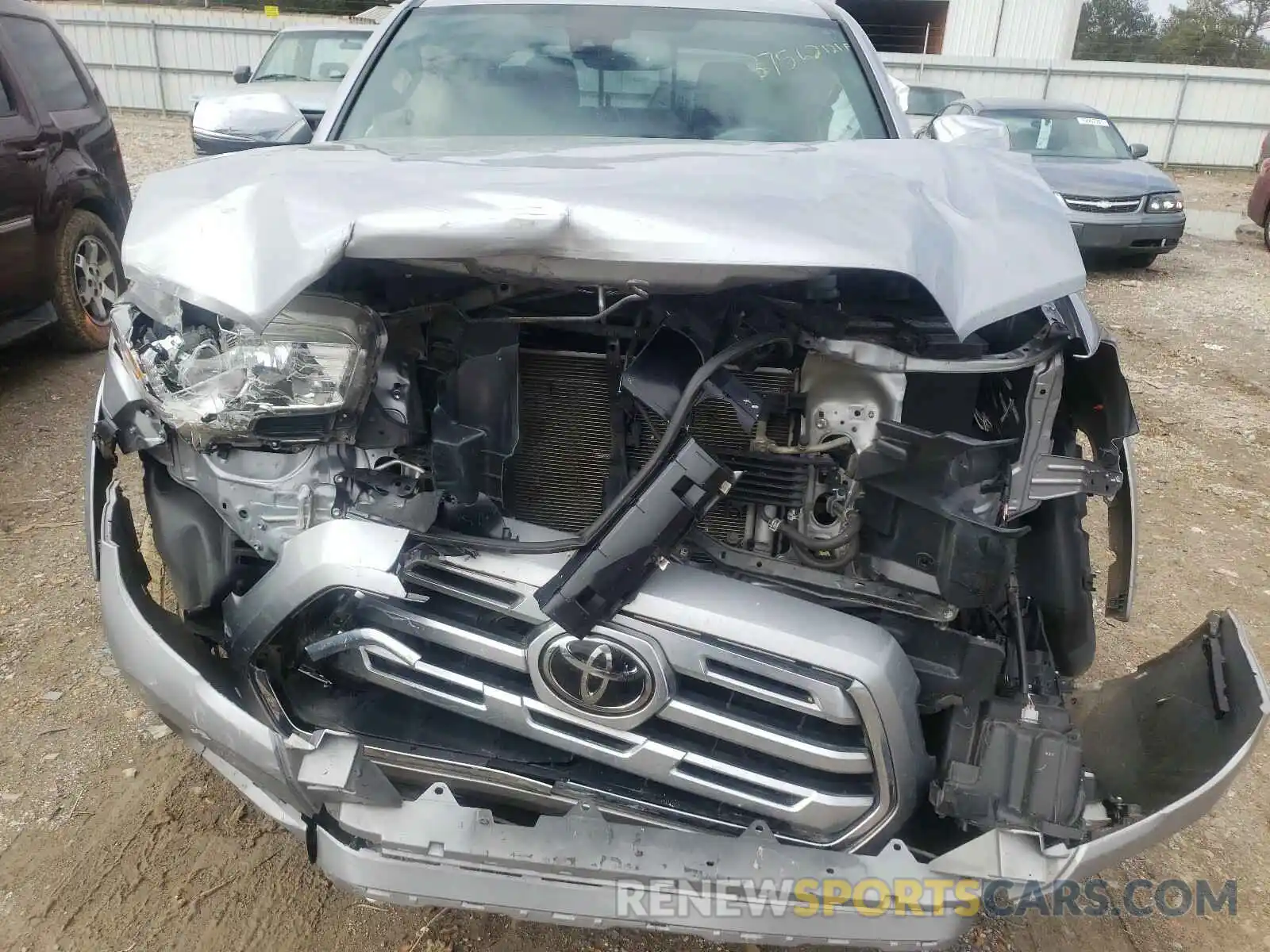 9 Photograph of a damaged car 3TMGZ5AN3KM208692 TOYOTA TACOMA 2019