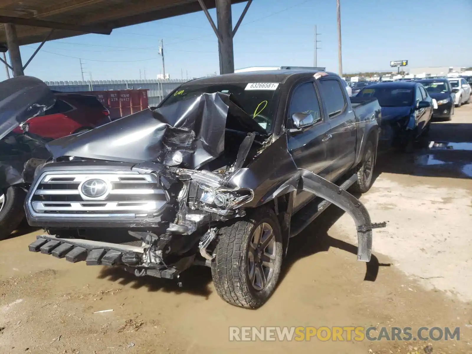 2 Photograph of a damaged car 3TMGZ5AN3KM239909 TOYOTA TACOMA 2019