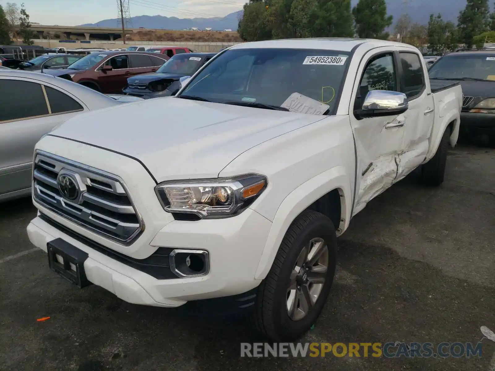 2 Photograph of a damaged car 3TMGZ5AN3KM265250 TOYOTA TACOMA 2019