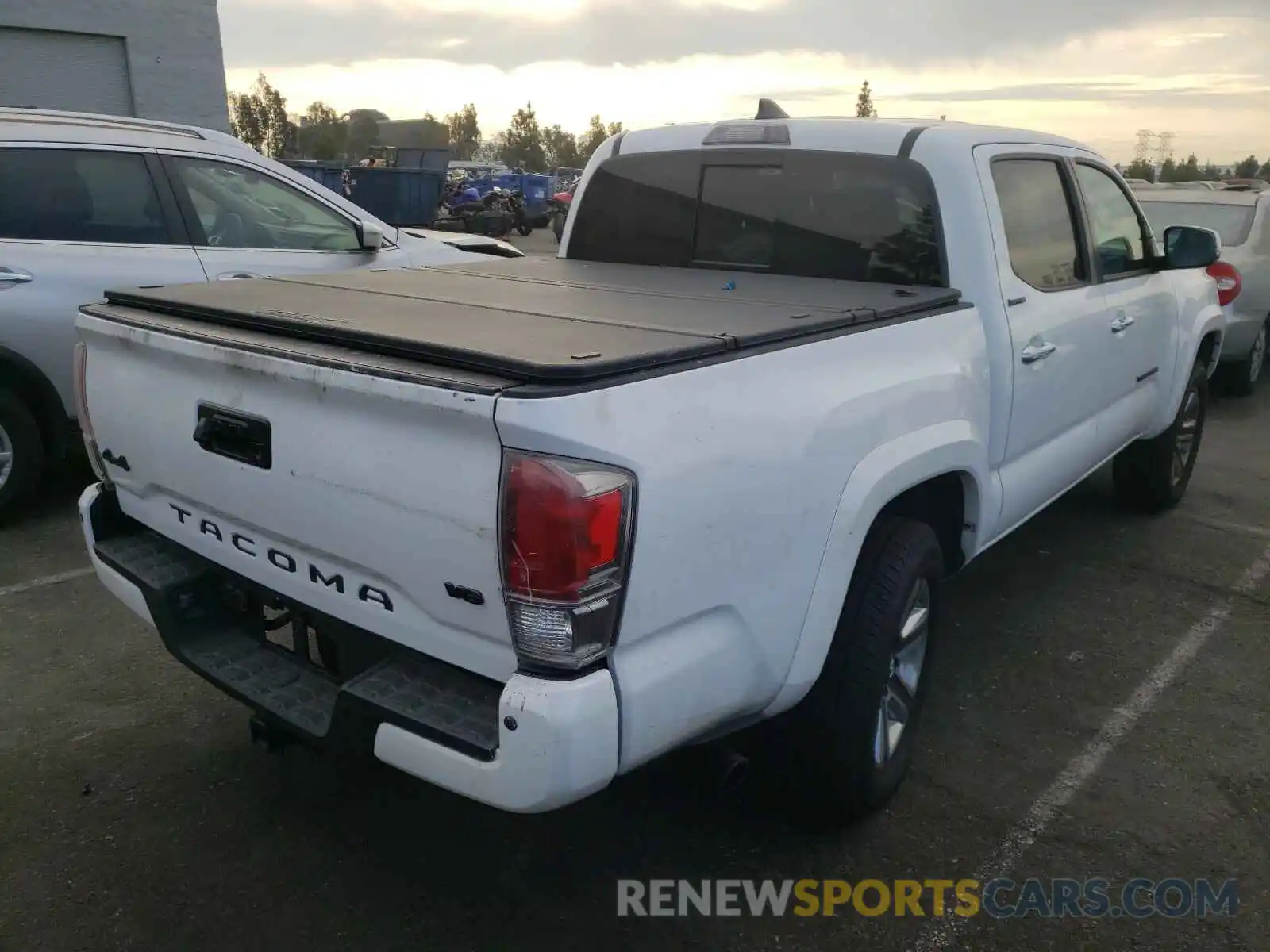 4 Photograph of a damaged car 3TMGZ5AN3KM265250 TOYOTA TACOMA 2019