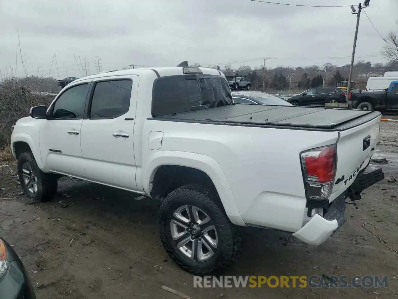 2 Photograph of a damaged car 3TMGZ5AN5KM189501 TOYOTA TACOMA 2019