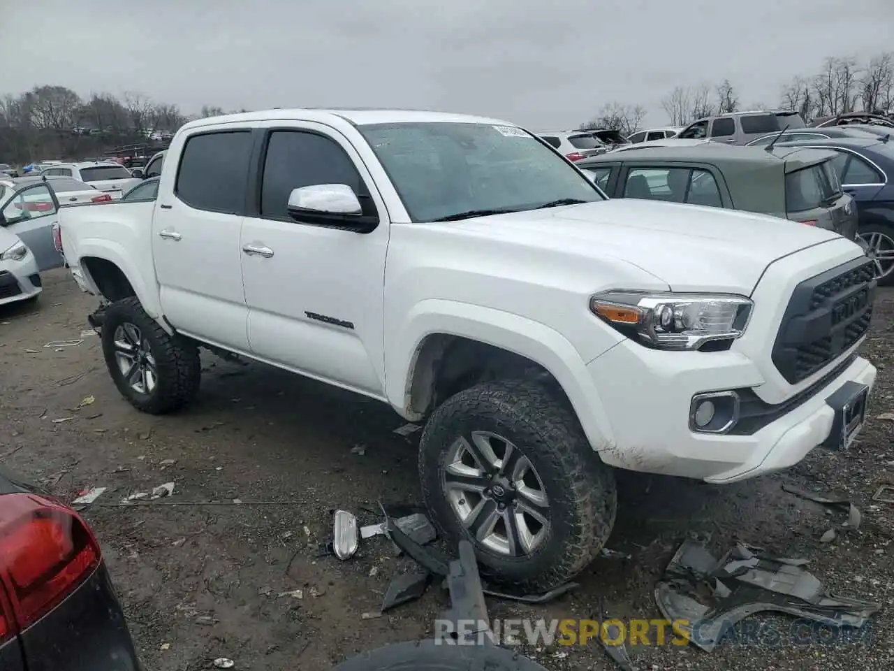 4 Photograph of a damaged car 3TMGZ5AN5KM189501 TOYOTA TACOMA 2019