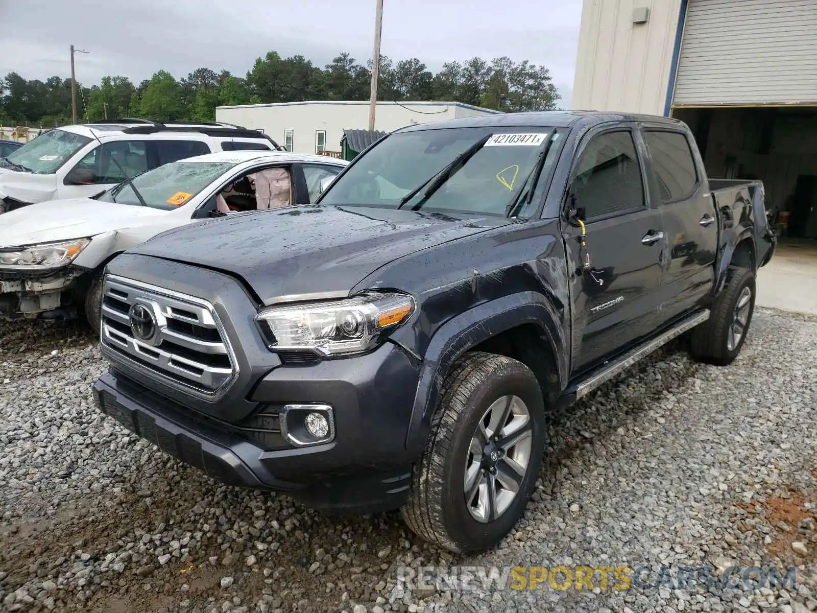 2 Photograph of a damaged car 3TMGZ5AN5KM255982 TOYOTA TACOMA 2019