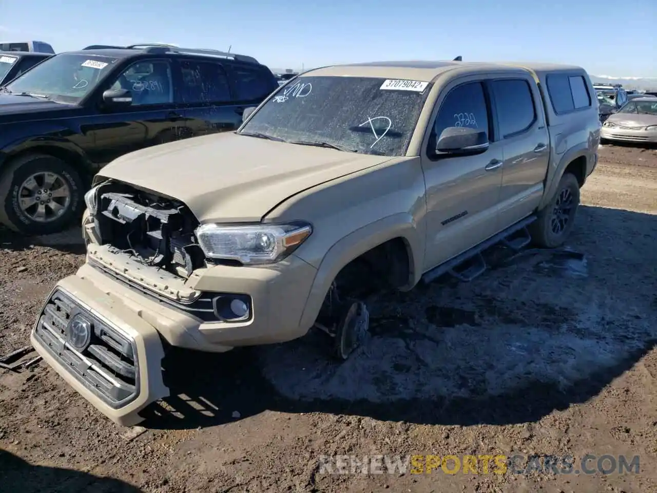 2 Photograph of a damaged car 3TMGZ5AN5KM269719 TOYOTA TACOMA 2019