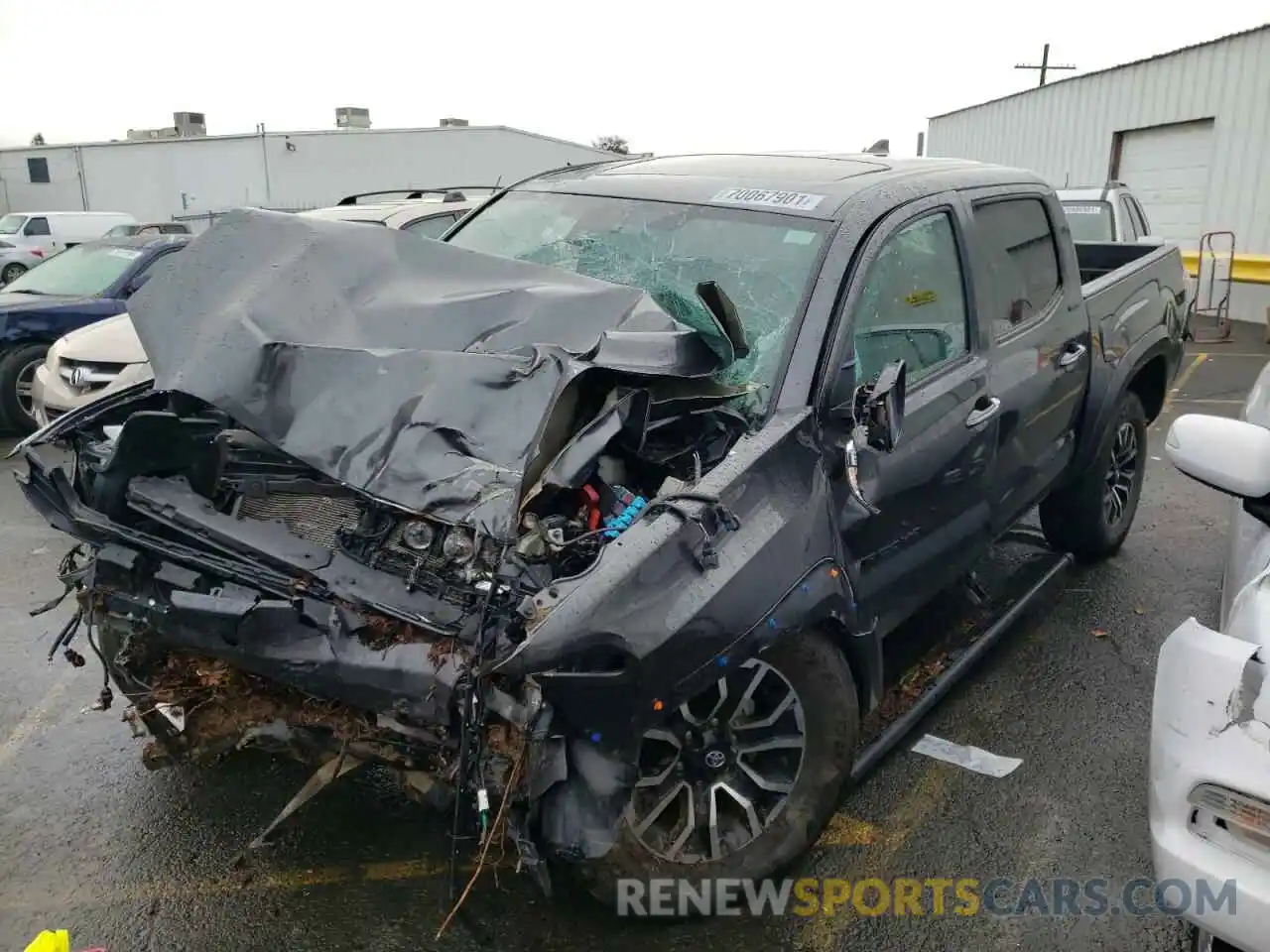 2 Photograph of a damaged car 3TMGZ5AN6KM188986 TOYOTA TACOMA 2019