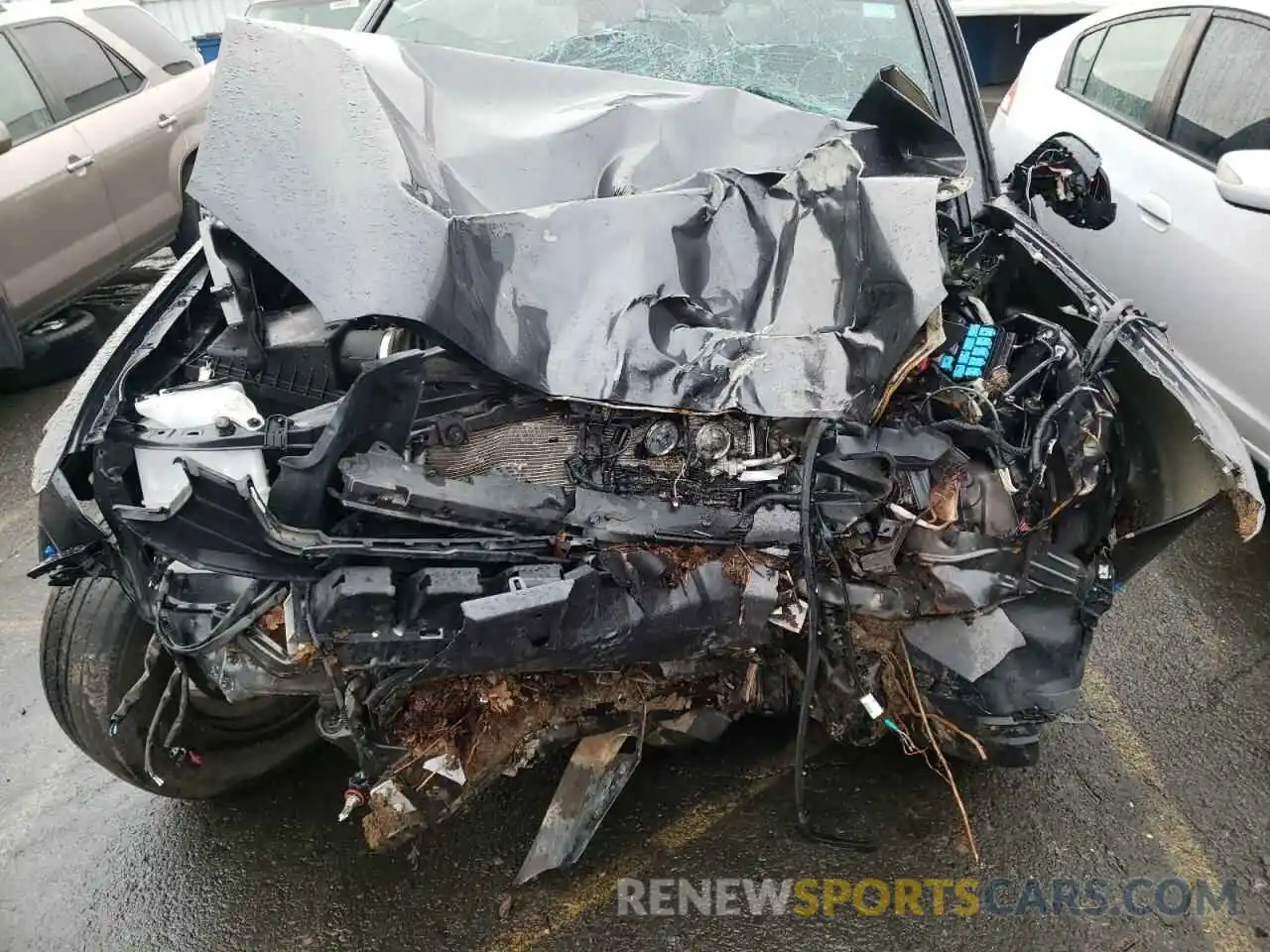 7 Photograph of a damaged car 3TMGZ5AN6KM188986 TOYOTA TACOMA 2019